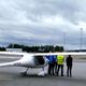 A two-seat electric plane made by Slovenian firm Pipistrel stands outside a hangar at Oslo Airport, Norway.